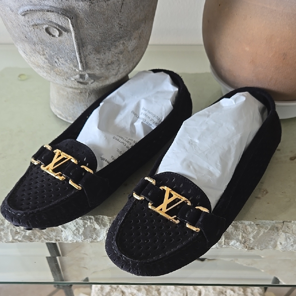 Louis Vuitton Black Loafers with Gold Accents LOGO